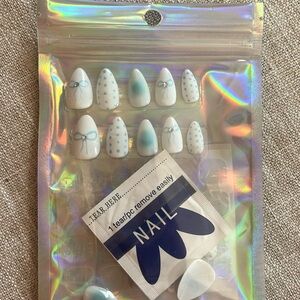 Blue bow nails! There are 20 nails included with a variety of sizes.